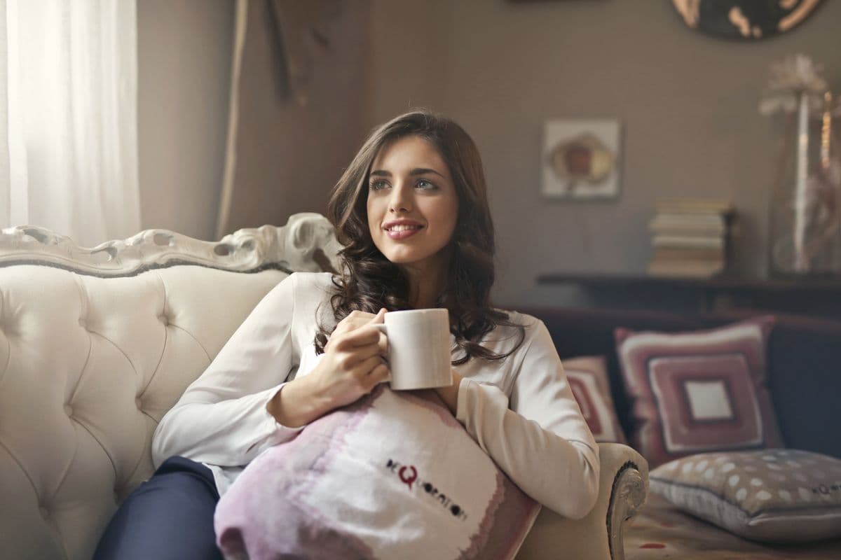 Customer relaxing at home while SafaiKart handles the laundry